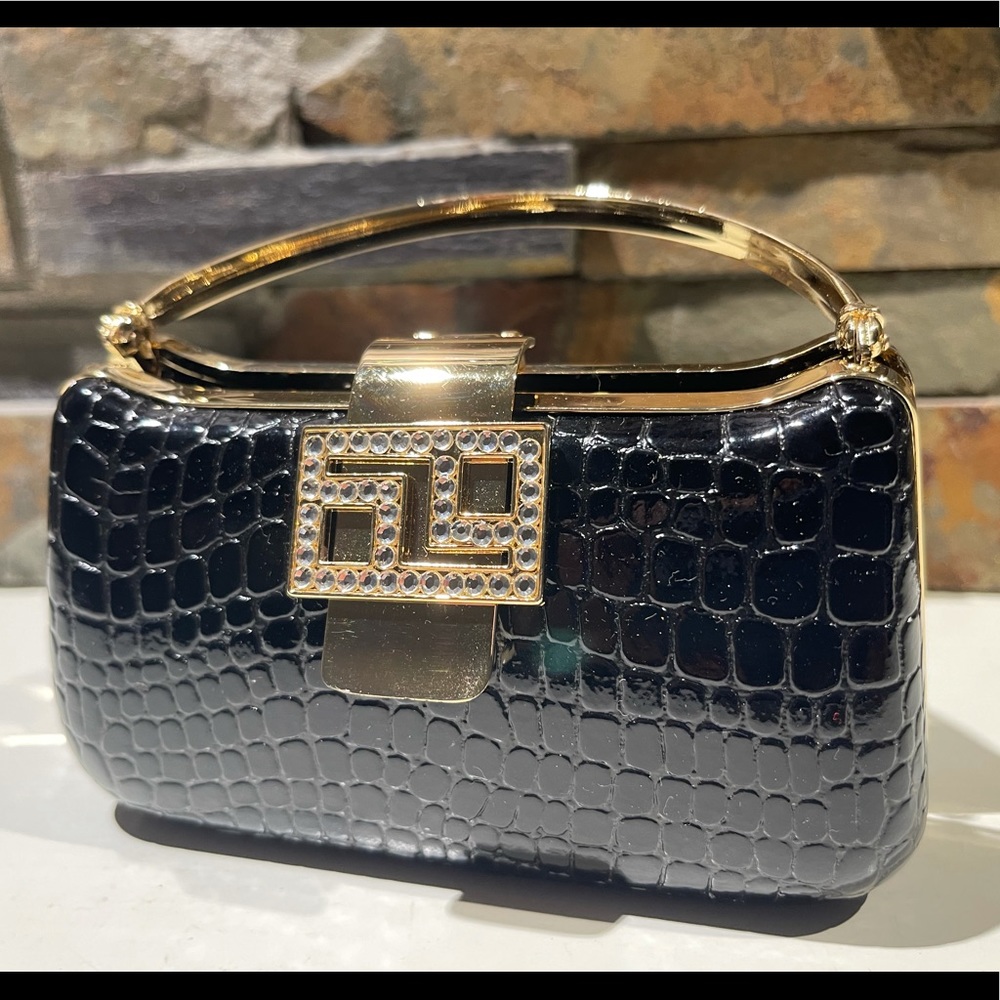 Vintage women’s black and gold evening bag